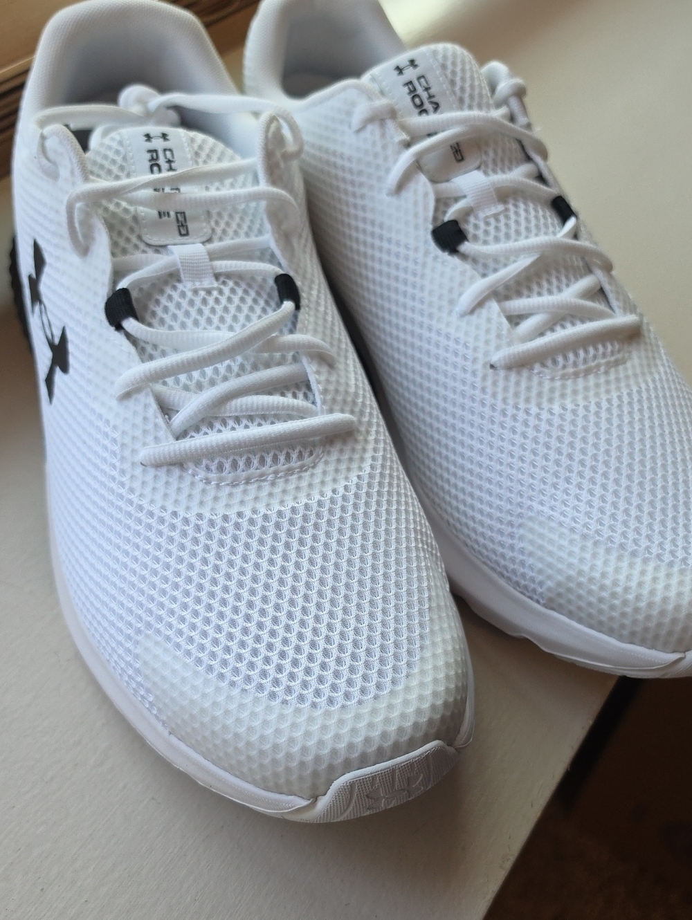 Under Armour Men’s White Athletic Shoes with Black Logo